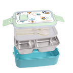 A 2-compartment stainless steel lunch box with a light blue base and a light green lid decorated with cartoon graphics. The box is shown open with a white plastic spoon inside, set against a plain white background.
